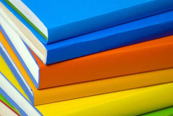 A stack of books in different colors.